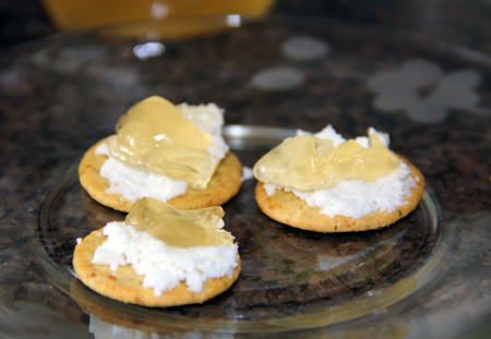 Wine jelly with goats cheese on crackers