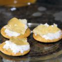 Wine jelly with goats cheese on crackers